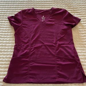 Small wine colored scrub top. Super soft worn 1-2 times. Excellent condition